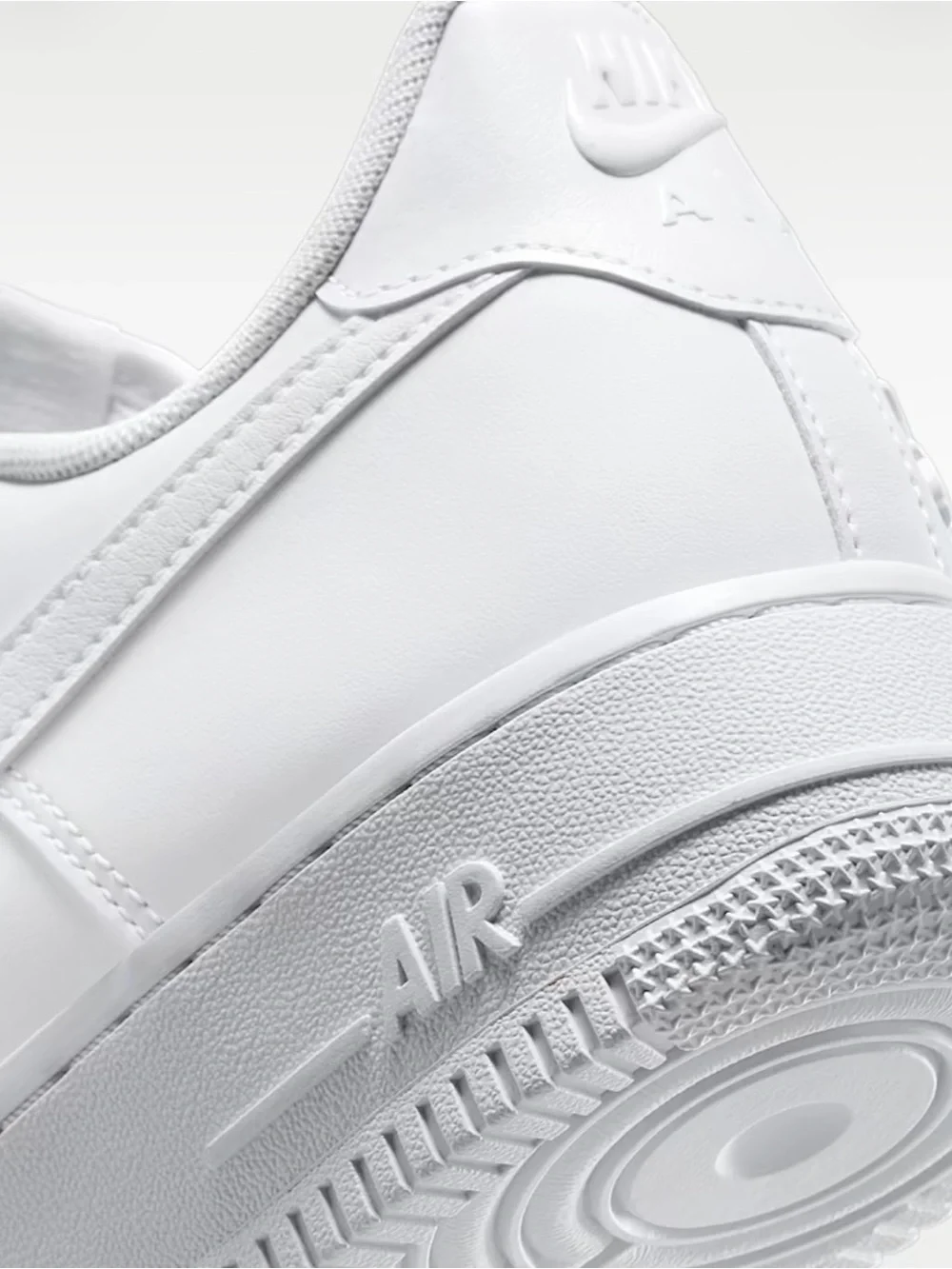 Nike Women’s White Embossed Rose Air Force 1 Sneakers